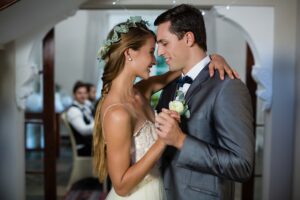 Wedding couple dancing in hall